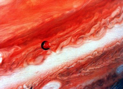 Mosaic of Jupiter and Its Inner Satellite Io by National Aeronautics and Space Administration National Aeronautics and Space Administration
